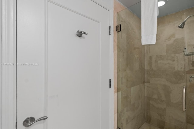 bathroom featuring an enclosed shower