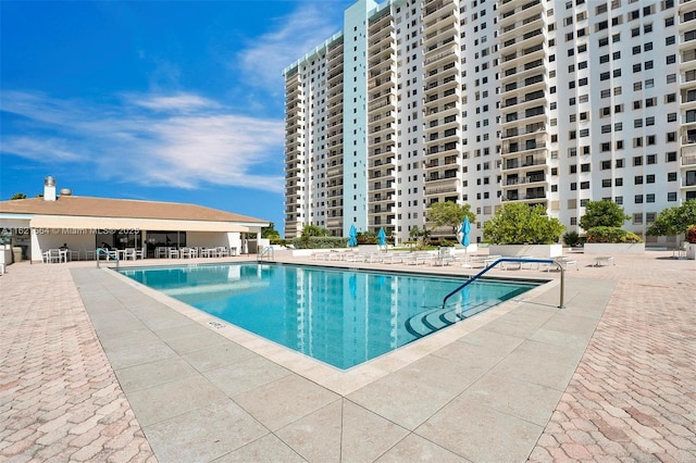 pool featuring a patio area