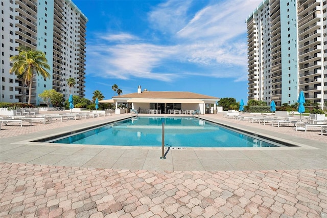 community pool featuring a patio area