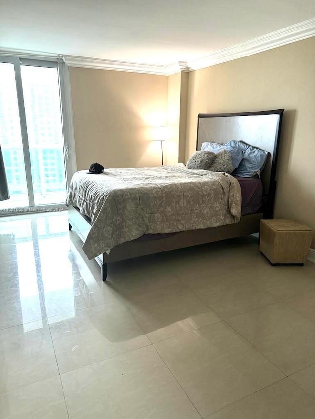 bedroom featuring tile patterned floors and ornamental molding