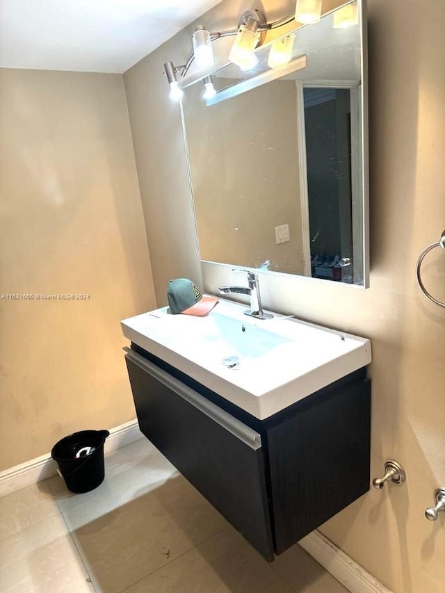 bathroom with vanity and tile patterned flooring