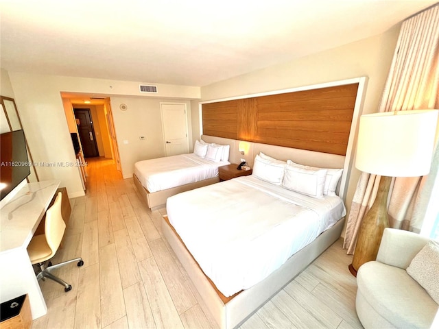 bedroom featuring light hardwood / wood-style flooring