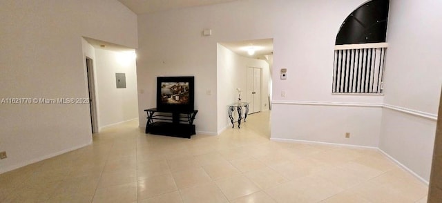 hall with light tile patterned floors