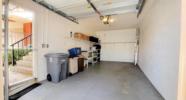 garage featuring a garage door opener