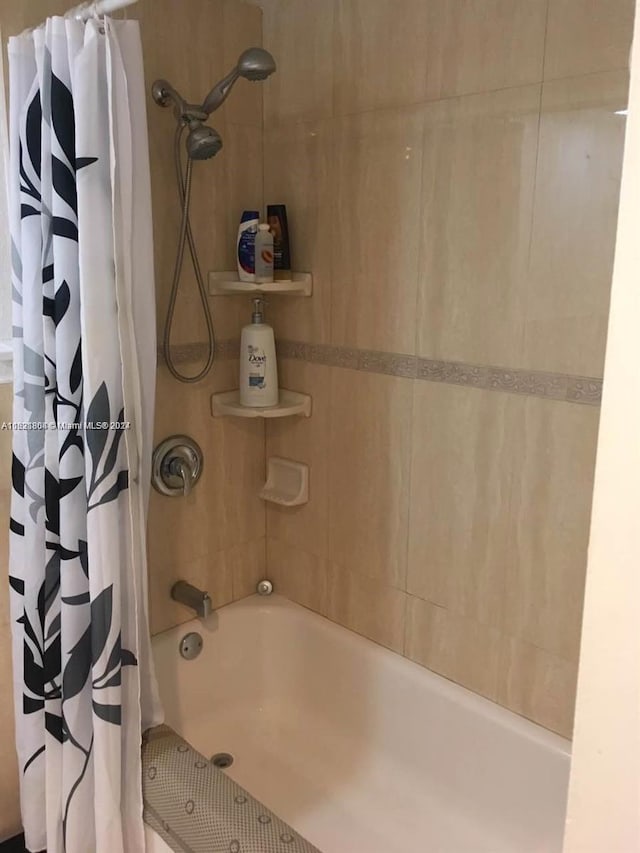 6707 N Kendall Dr Unit 115, Pinecrest, FL 33156 - bathroom with shower / bath combo with shower curtain