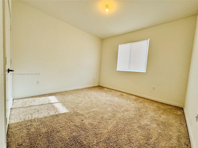 view of carpeted spare room