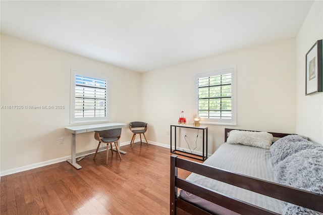 bedroom featuring hardwood / wood-style floors