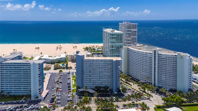 aerial view with a view of the beach and a water view