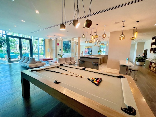 rec room with floor to ceiling windows and pool table