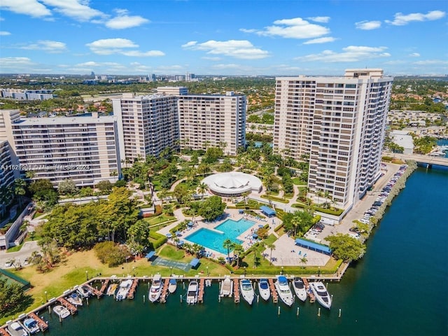 birds eye view of property with a water view