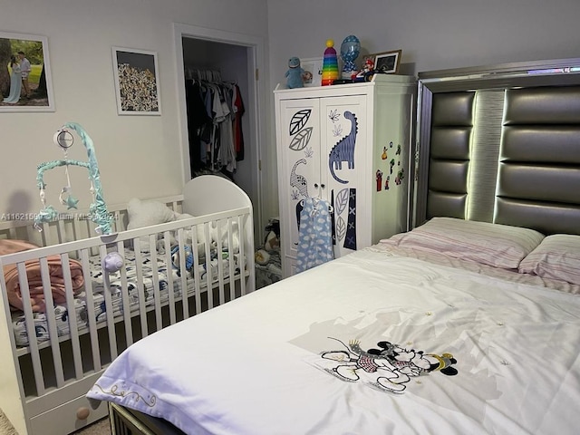 bedroom featuring a closet and a spacious closet