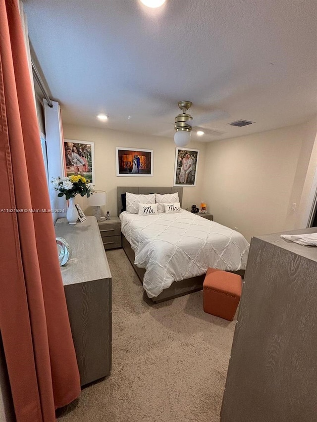 bedroom featuring carpet floors and ceiling fan