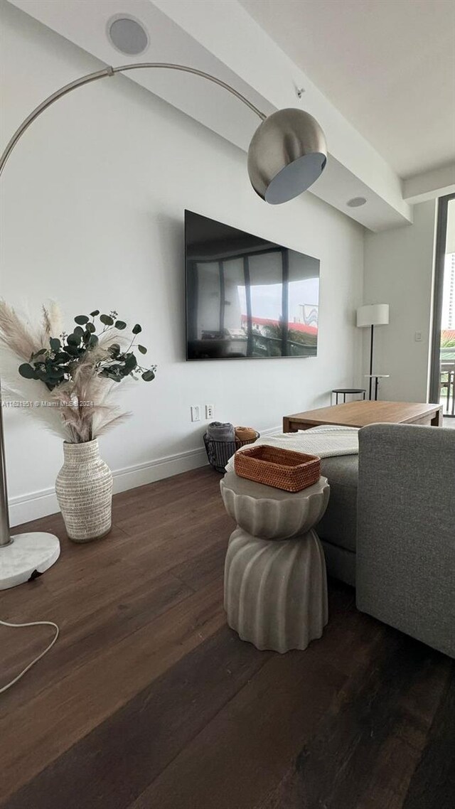 workout area with expansive windows and light hardwood / wood-style floors