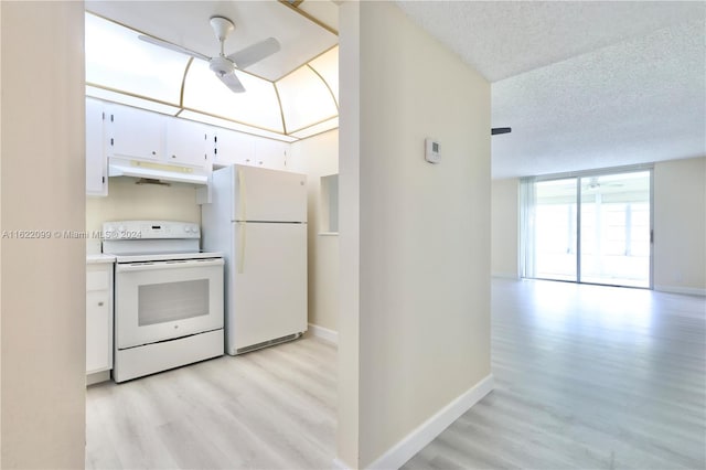 kitchen with white appliances, ceiling fan, light hardwood / wood-style floors, white cabinets, and a textured ceiling