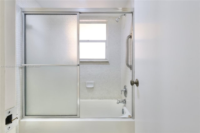 bathroom featuring enclosed tub / shower combo