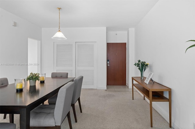 view of carpeted dining space