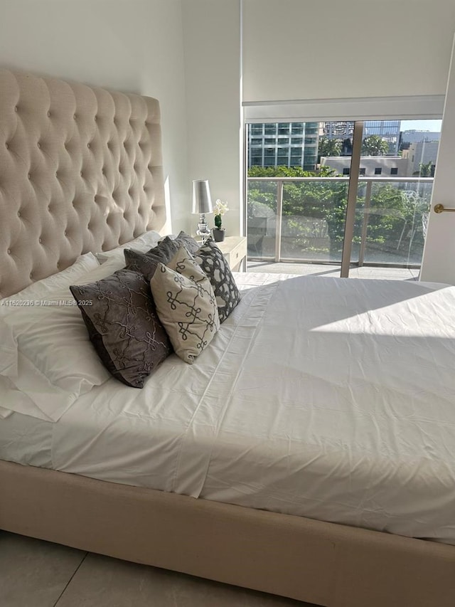2678 Tigertail Ave Unit 515, Miami, FL 33133 - tiled bedroom featuring access to outside