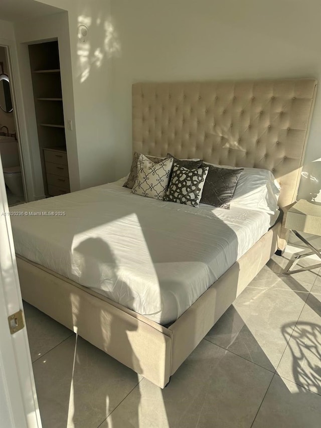 2678 Tigertail Ave Unit 515, Miami, FL 33133 - bedroom featuring tile patterned floors