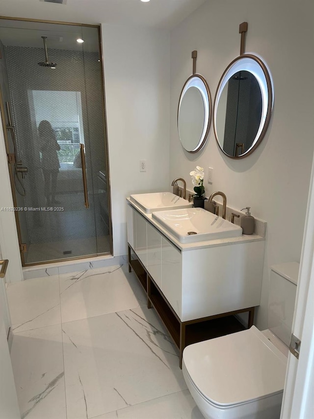 2678 Tigertail Ave Unit 515, Miami, FL 33133 - full bath with a sink, a shower stall, toilet, and marble finish floor