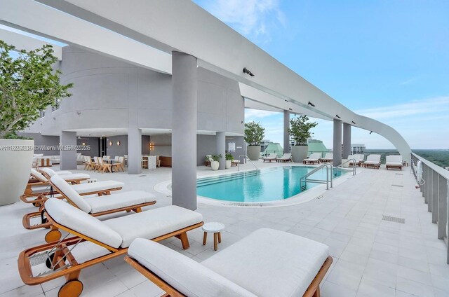 2678 Tigertail Ave Unit 515, Miami, FL 33133 - community pool featuring a patio