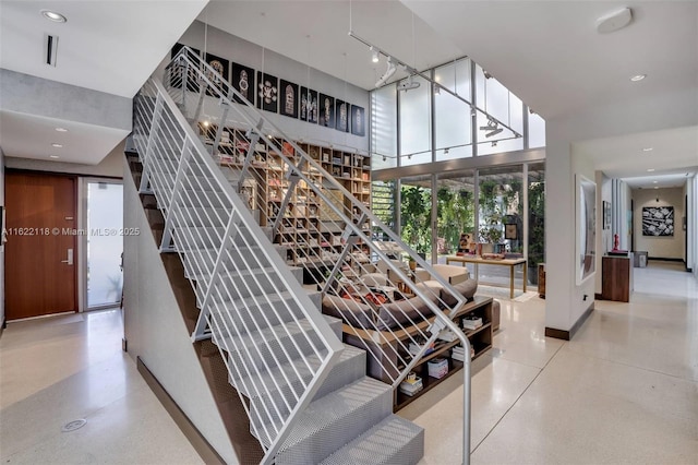 stairs with a towering ceiling