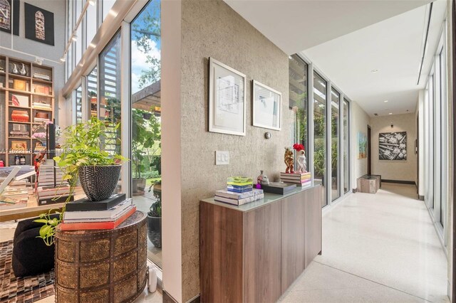 bedroom with access to exterior and light hardwood / wood-style floors