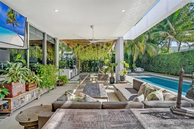 view of patio with a fenced in pool, area for grilling, an outdoor living space, and ceiling fan