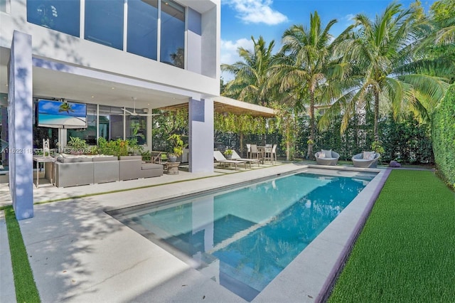 view of swimming pool with an outdoor hangout area and a patio area