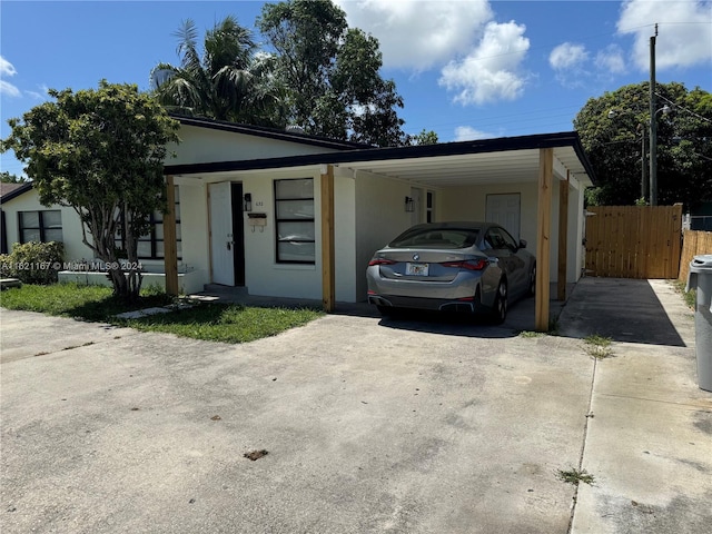 view of front of house with a carport