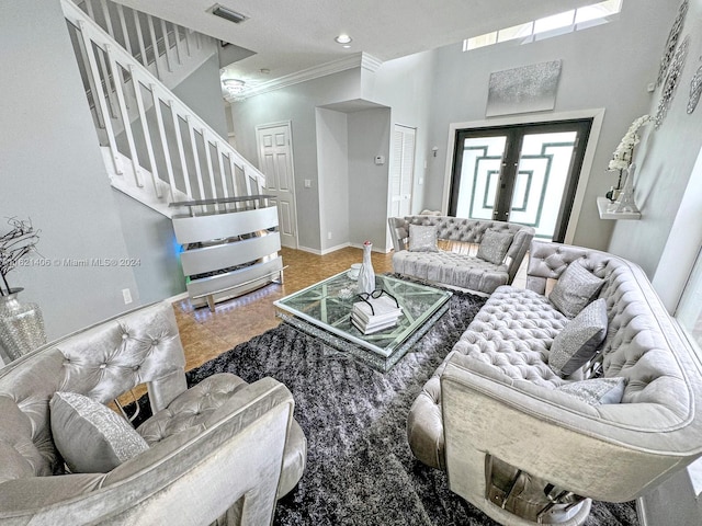 tiled living room featuring ornamental molding