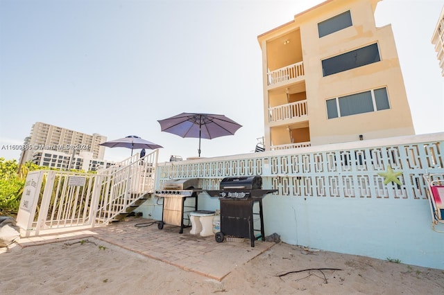 view of patio featuring a grill