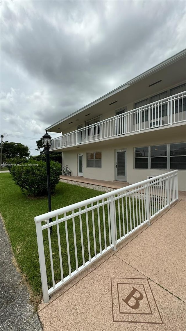 view of home's exterior featuring a yard