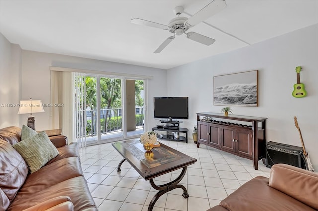 living room featuring light tile patterned flooring and ceiling fan