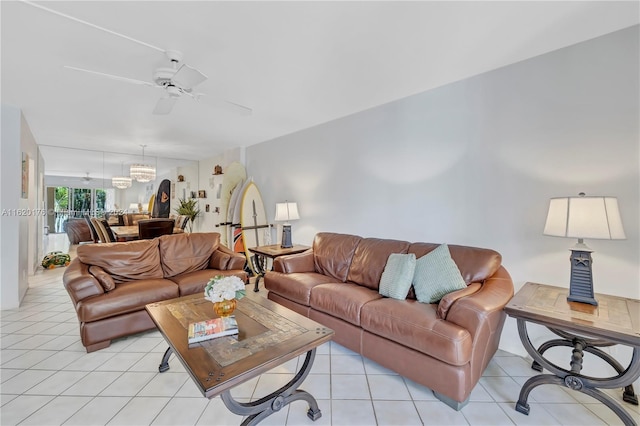 living room featuring ceiling fan and light tile patterned floors