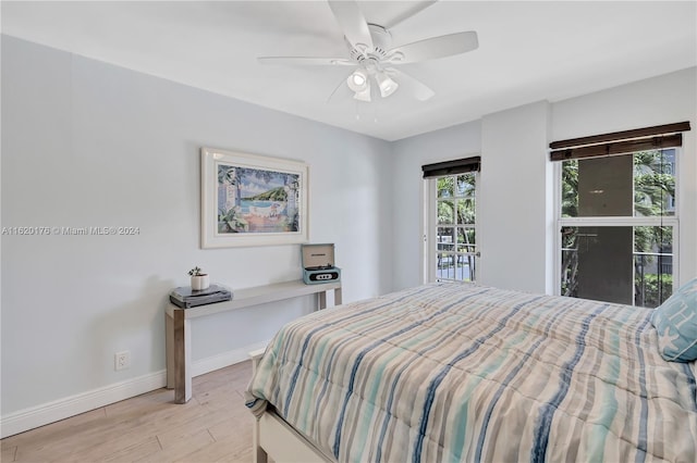 bedroom featuring access to outside, ceiling fan, and light hardwood / wood-style floors