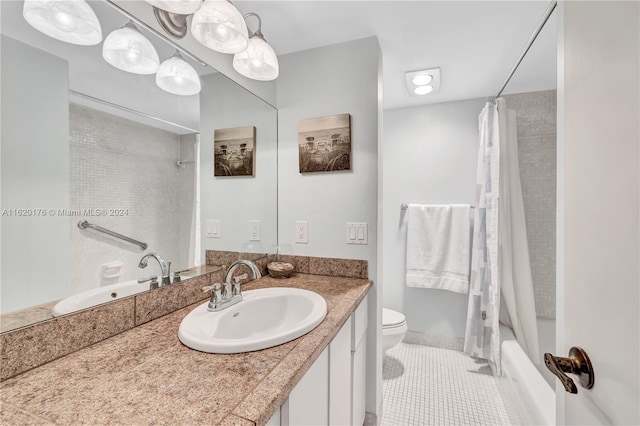 full bathroom with shower / tub combo, vanity, toilet, and tile patterned flooring