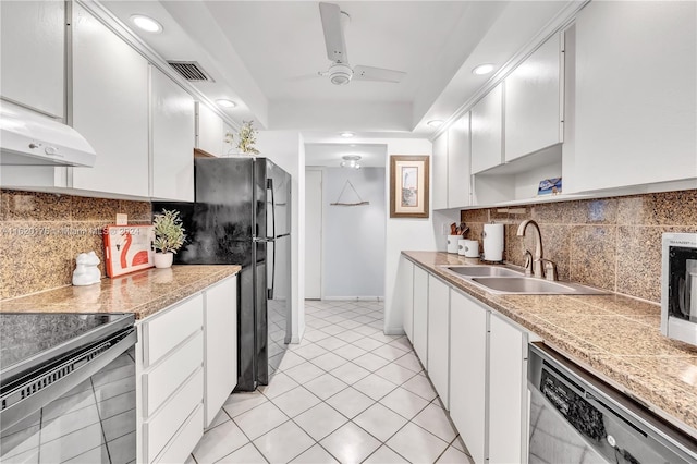 kitchen featuring sink, white cabinetry, tasteful backsplash, ceiling fan, and black appliances