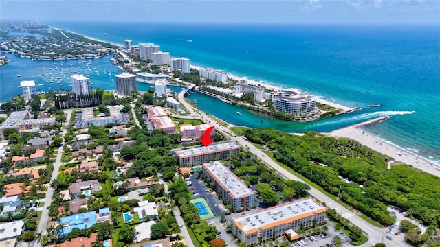 bird's eye view with a water view and a view of the beach