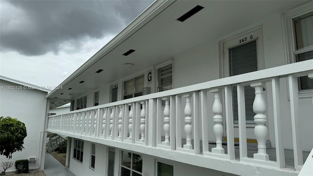 exterior space featuring a balcony and central AC