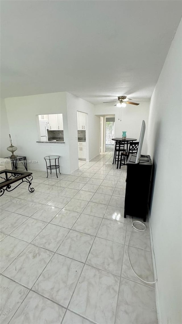 living room with ceiling fan