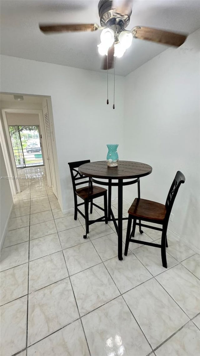 dining room with light tile patterned floors