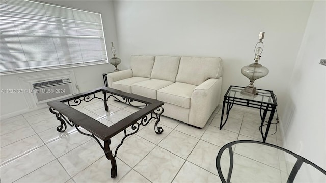 living room featuring light tile patterned floors and a wall mounted AC