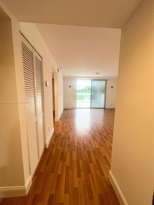 hall featuring dark wood-type flooring