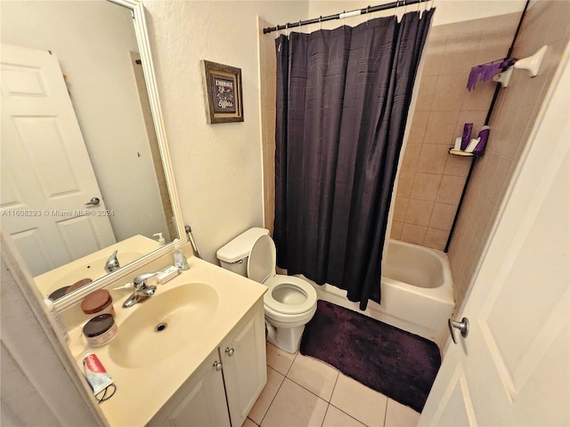 full bathroom with toilet, shower / tub combo with curtain, tile patterned flooring, and vanity