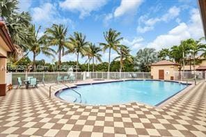 view of swimming pool featuring a patio area