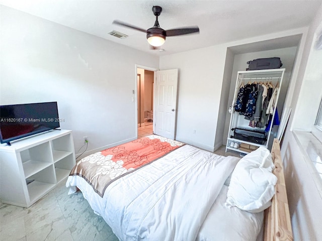 bedroom featuring a closet and ceiling fan