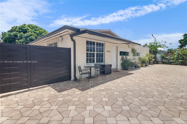 view of front of property featuring a patio