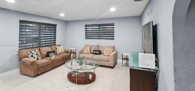 living room with light tile patterned floors