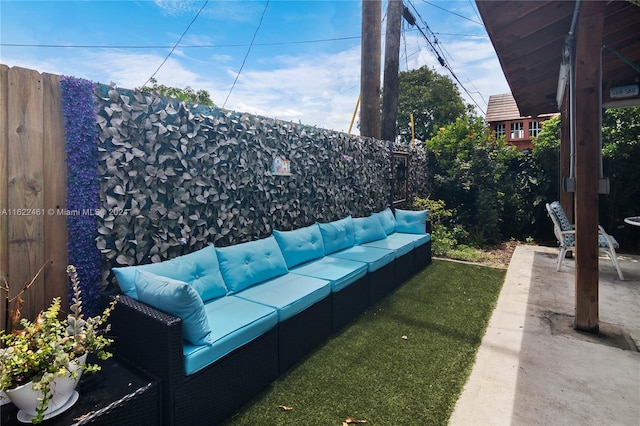 exterior space with an outdoor living space and a patio area