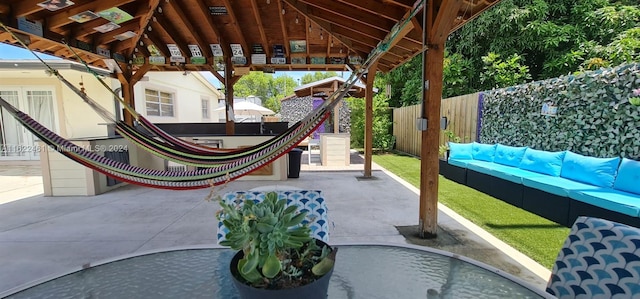 view of patio with a gazebo and an outdoor living space